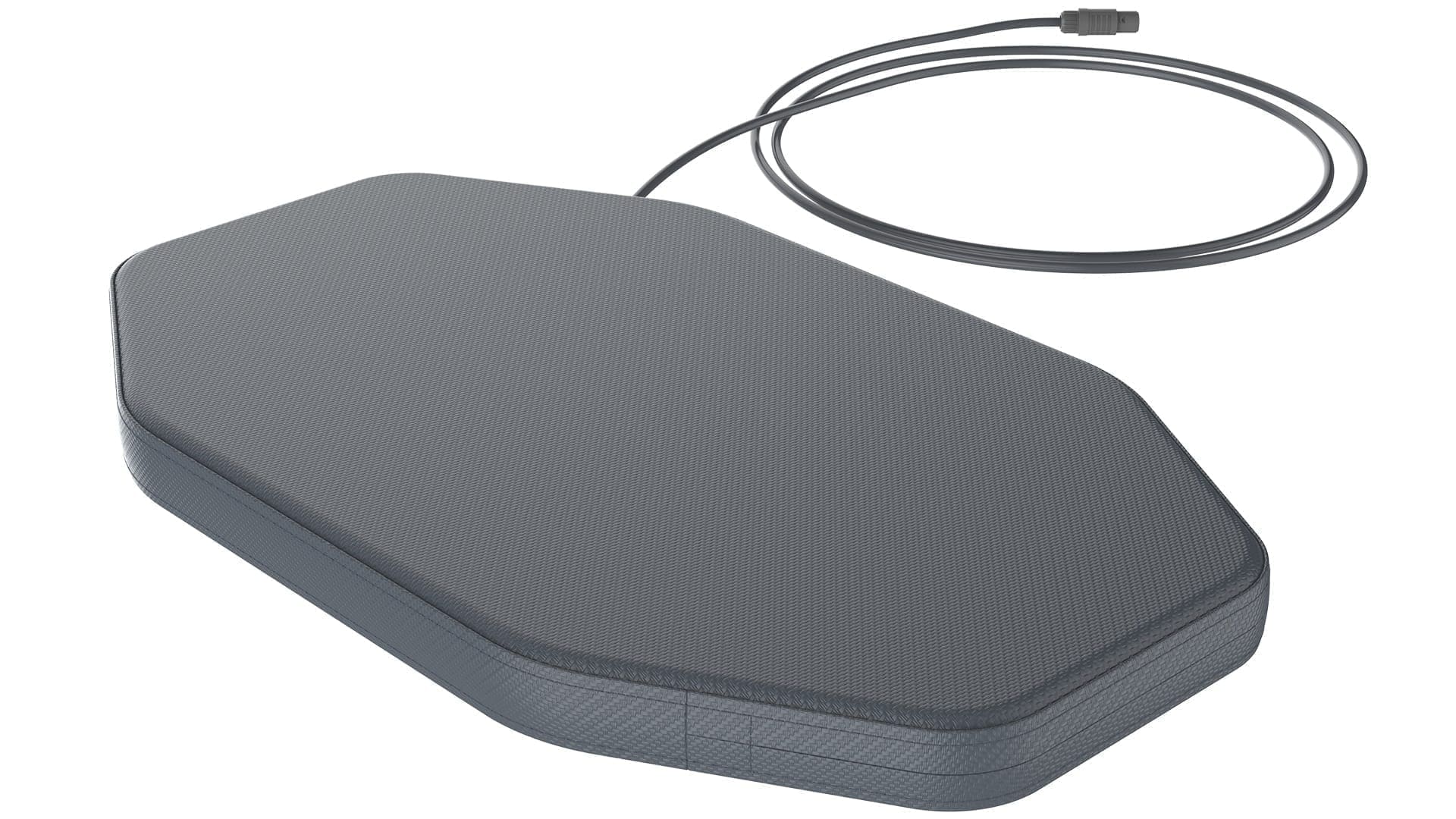 A gray and black wireless charger is connected to the cord.